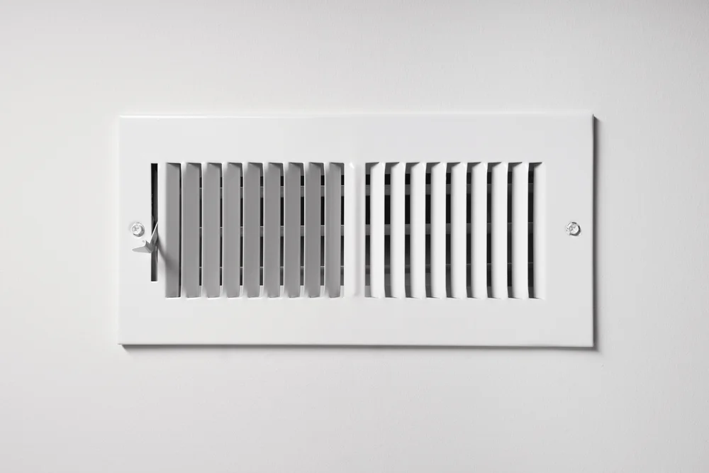 Outlet grille for a ducted heating system