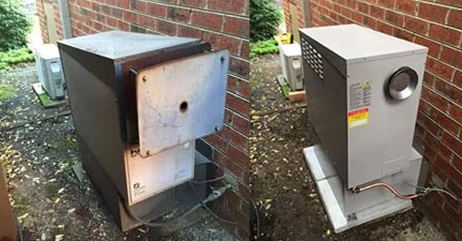 Gas ducted heating equipment beside brick exterior walls