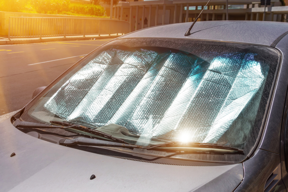 Reflective windshield protecting a car from the sunshine